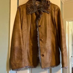 Leather jacket with faux fur liner